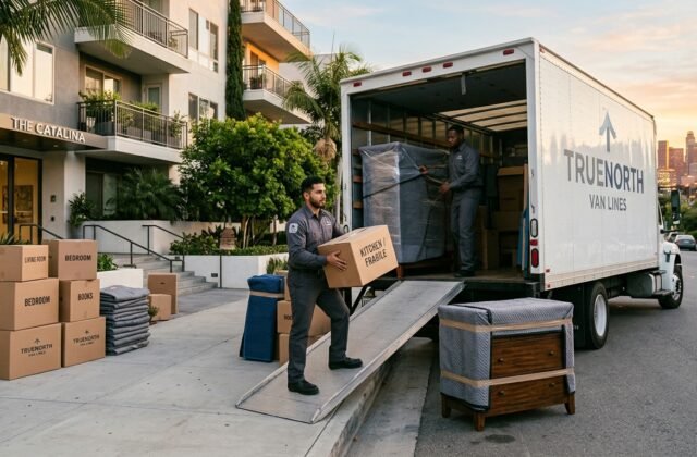 Professional movers loading a truck during a move-out at a Los Angeles apartment building